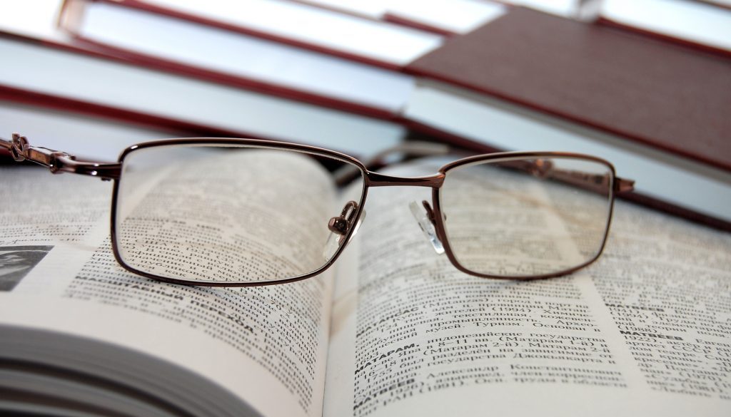 Eyeglasses on books