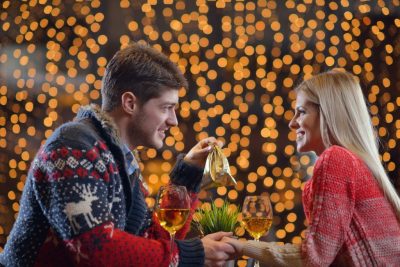 young man gives a gift to girl